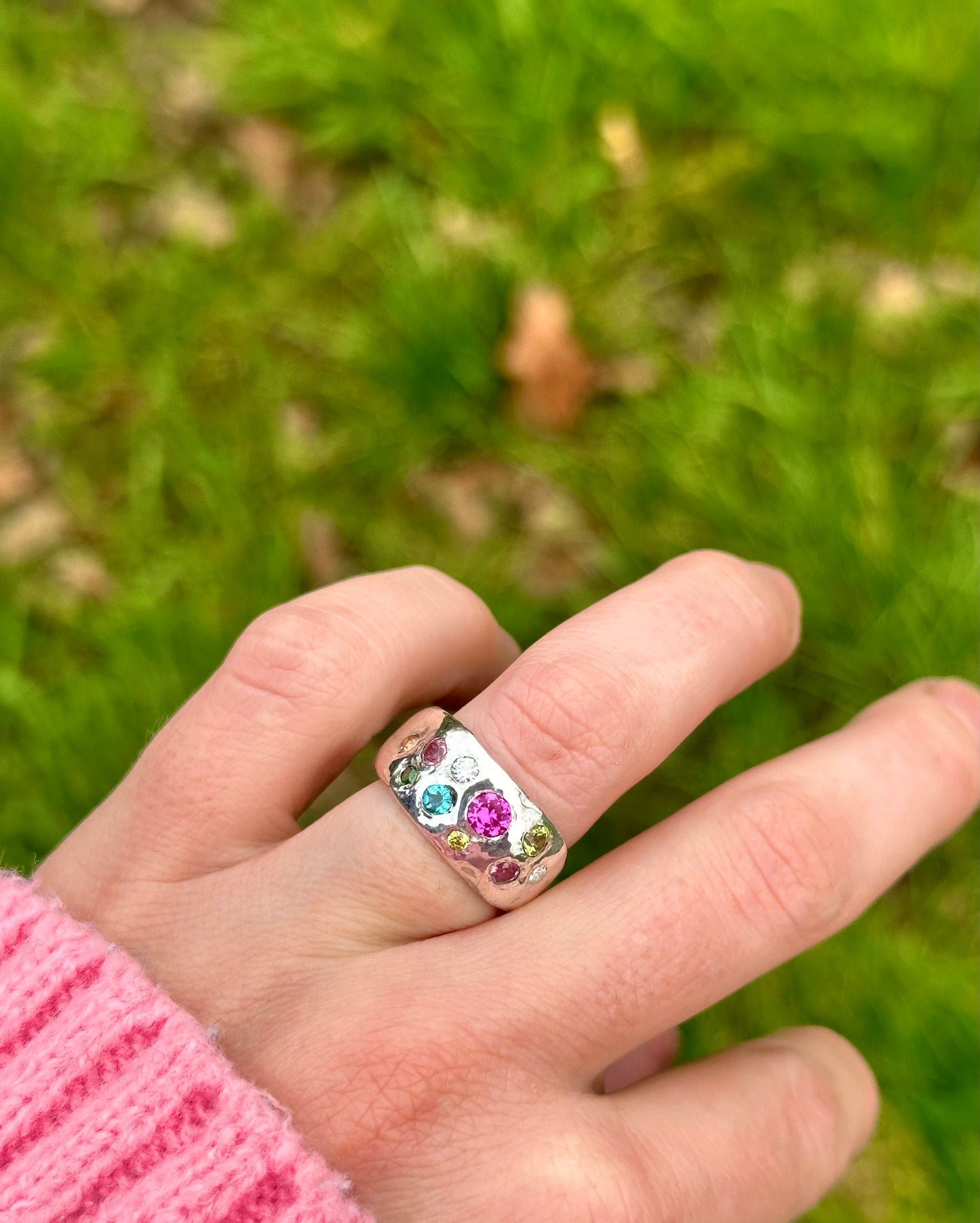 Mixed gemstone ring with two diamonds