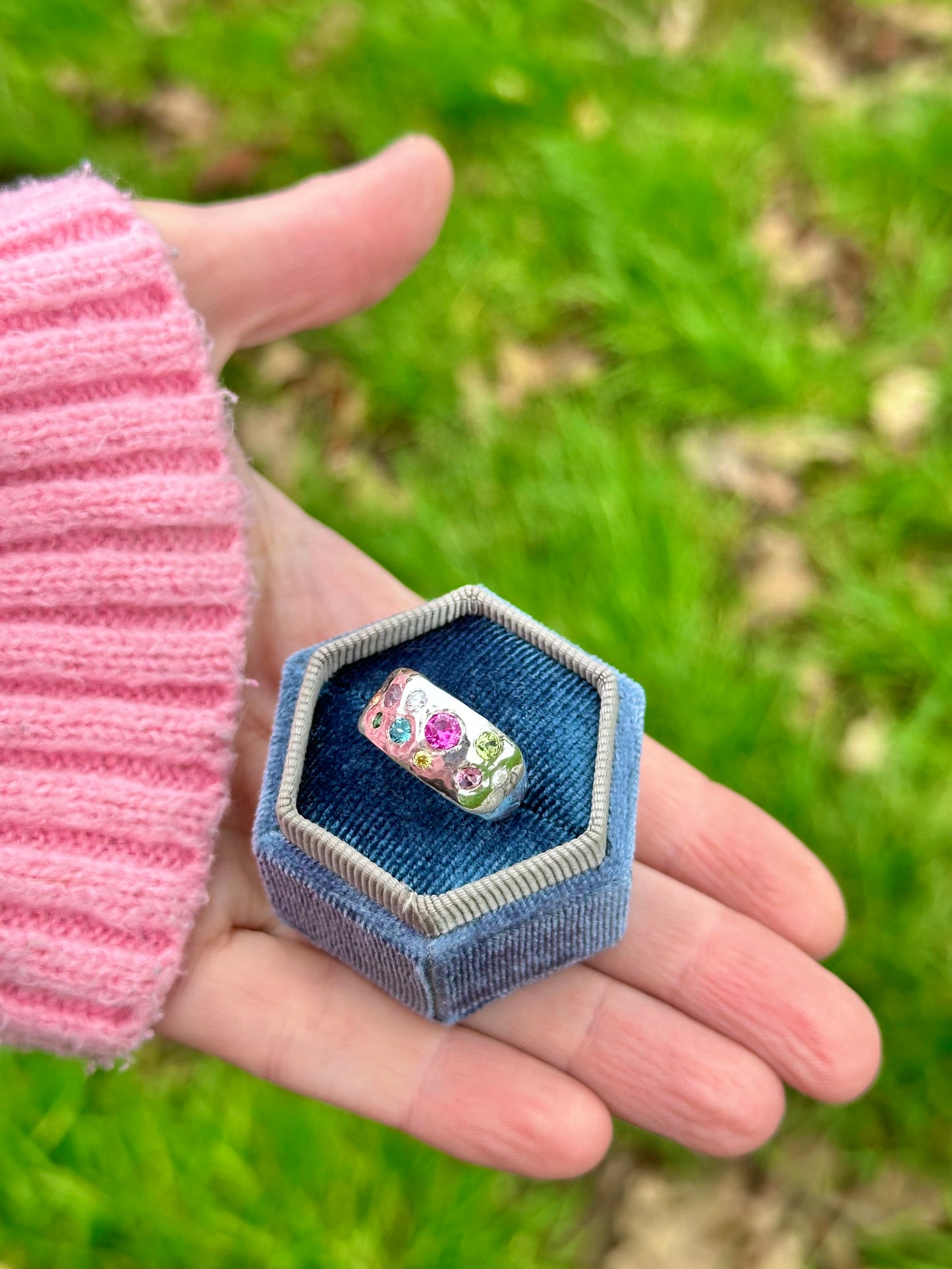 Mixed gemstone ring with two diamonds