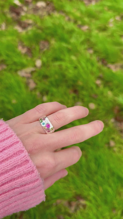 Mixed gemstone ring with two diamonds